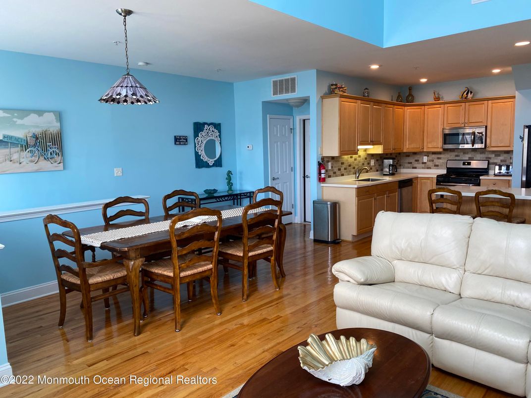 Dining room, Interior, Kitchen, Living room, Pendant Lights, Recessed Lighting, Stainless Steel Appliances, Wood Texture Flooring