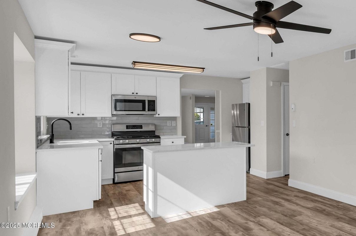 Interior, Kitchen, Recessed Lighting, Stainless Steel Appliances, Wood Texture Flooring
