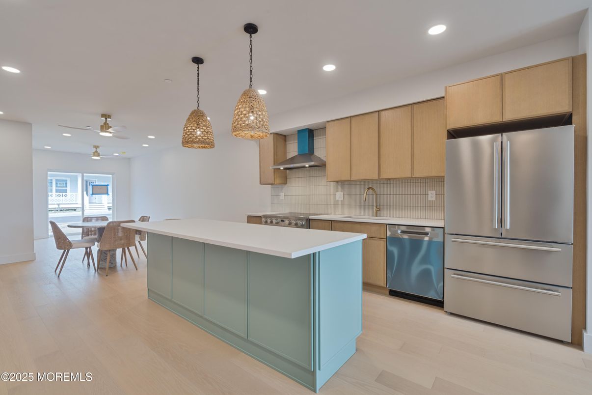 Dining room, Interior, Kitchen, Pendant Lights, Recessed Lighting, Stainless Steel Appliances, Wood Texture Flooring