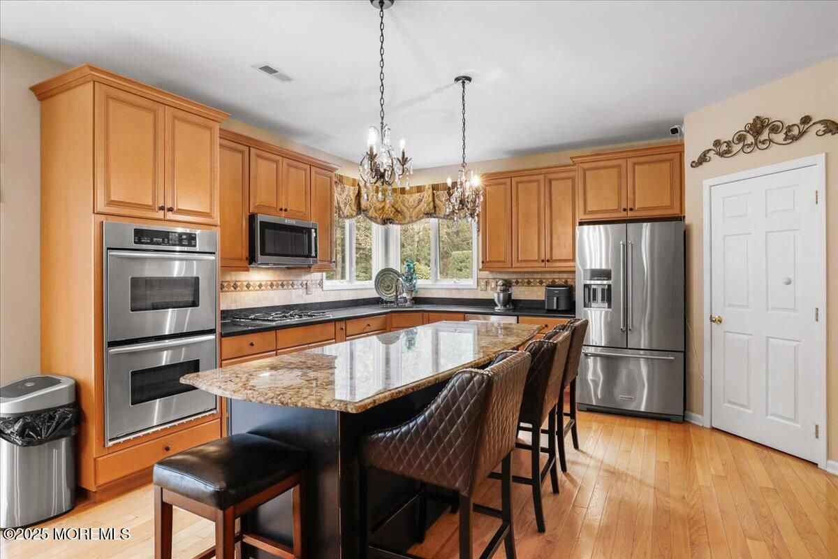 Chandelier, Interior, Kitchen, Pendant Lights, Stainless Steel Appliances, Wood Texture Flooring