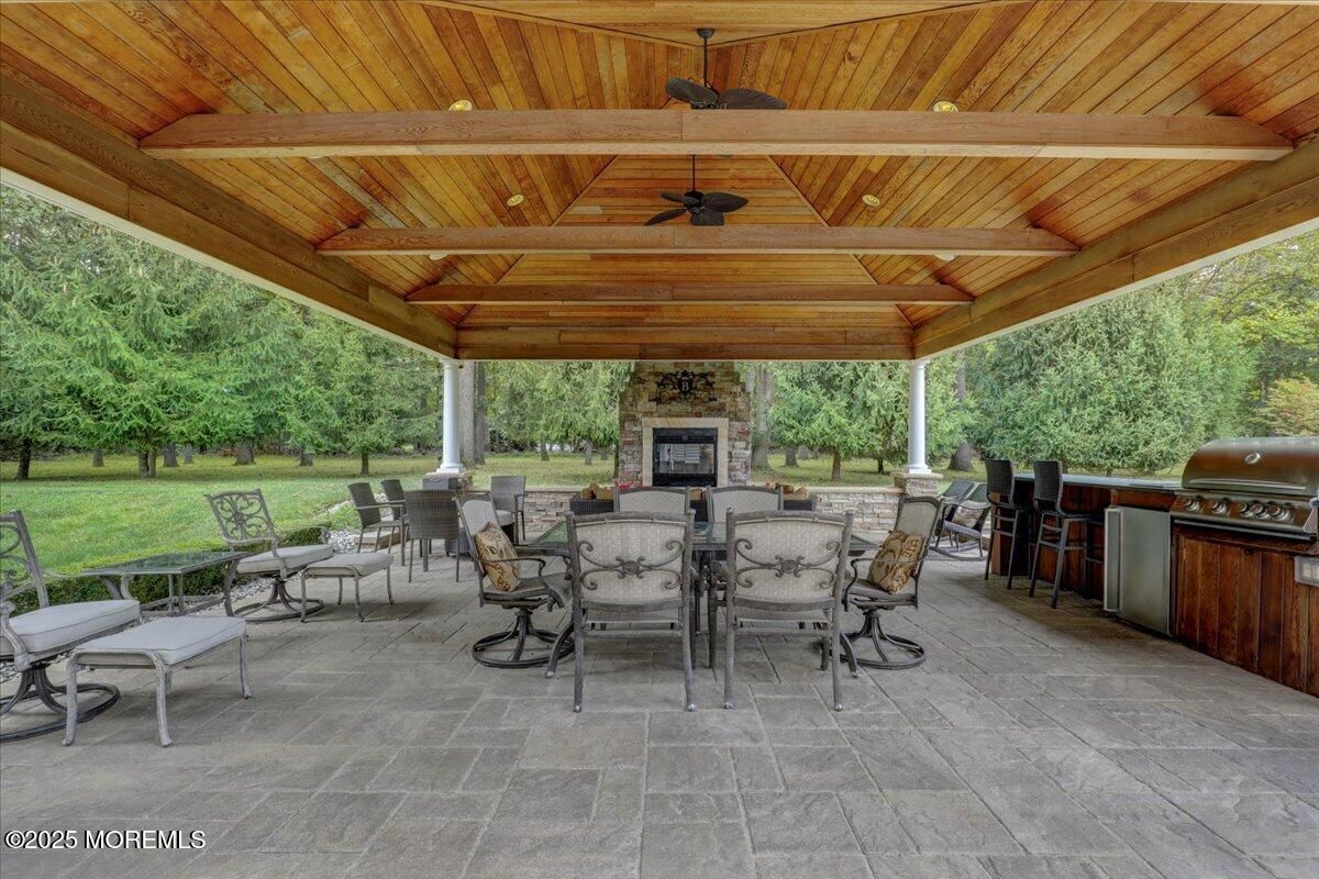 Exterior, Fireplace, Outdoor Kitchen