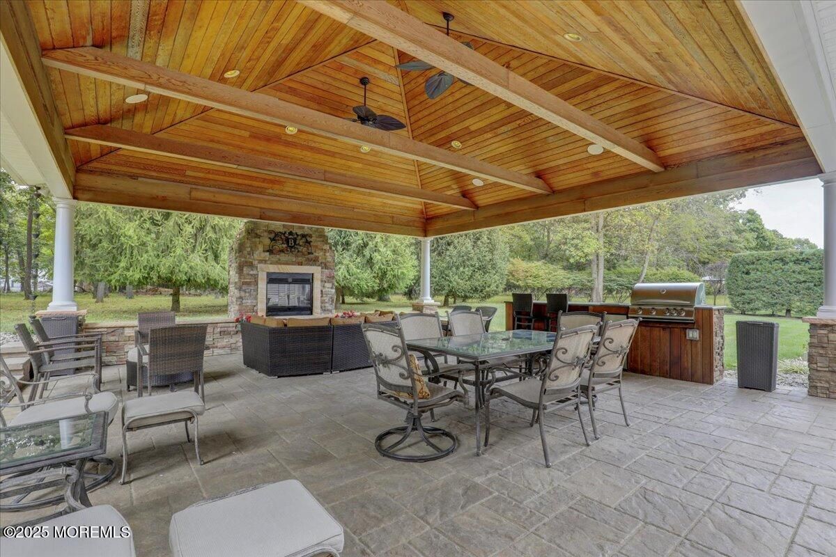 Exterior, Fireplace, Outdoor Kitchen