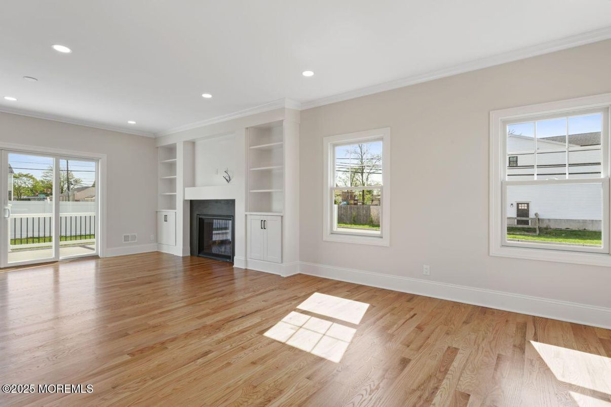 Empty room, Fireplace, Interior, Recessed Lighting, Wood Texture Flooring