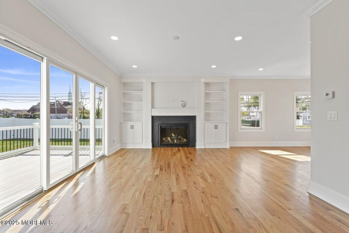 Empty room, Fireplace, Interior, Recessed Lighting, Wood Texture Flooring