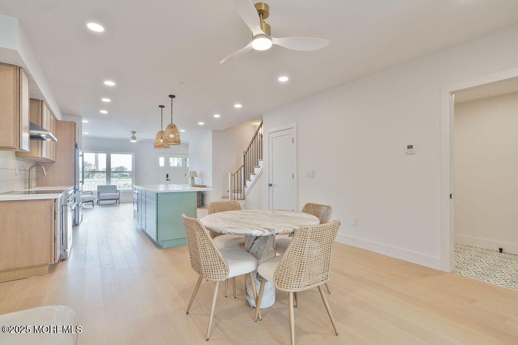 Dining room, Interior, Kitchen, Pendant Lights, Recessed Lighting, Stainless Steel Appliances, Wood Texture Flooring