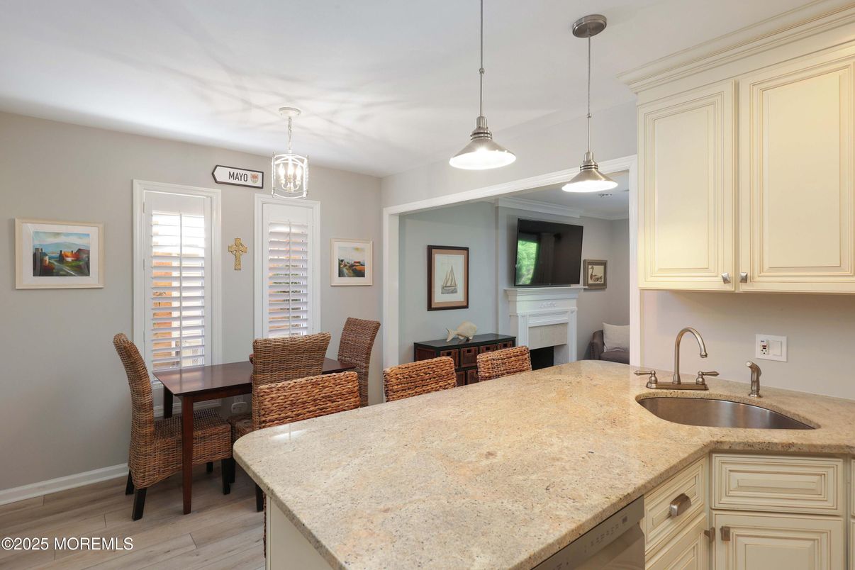 Dining room, Fireplace, Interior, Pendant Lights, Wood Texture Flooring