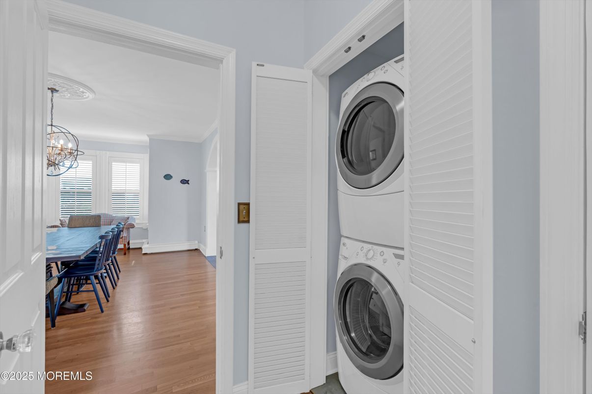 Chandelier, Dining room, Interior, Utility Closets, Washer, Wood Texture Flooring
