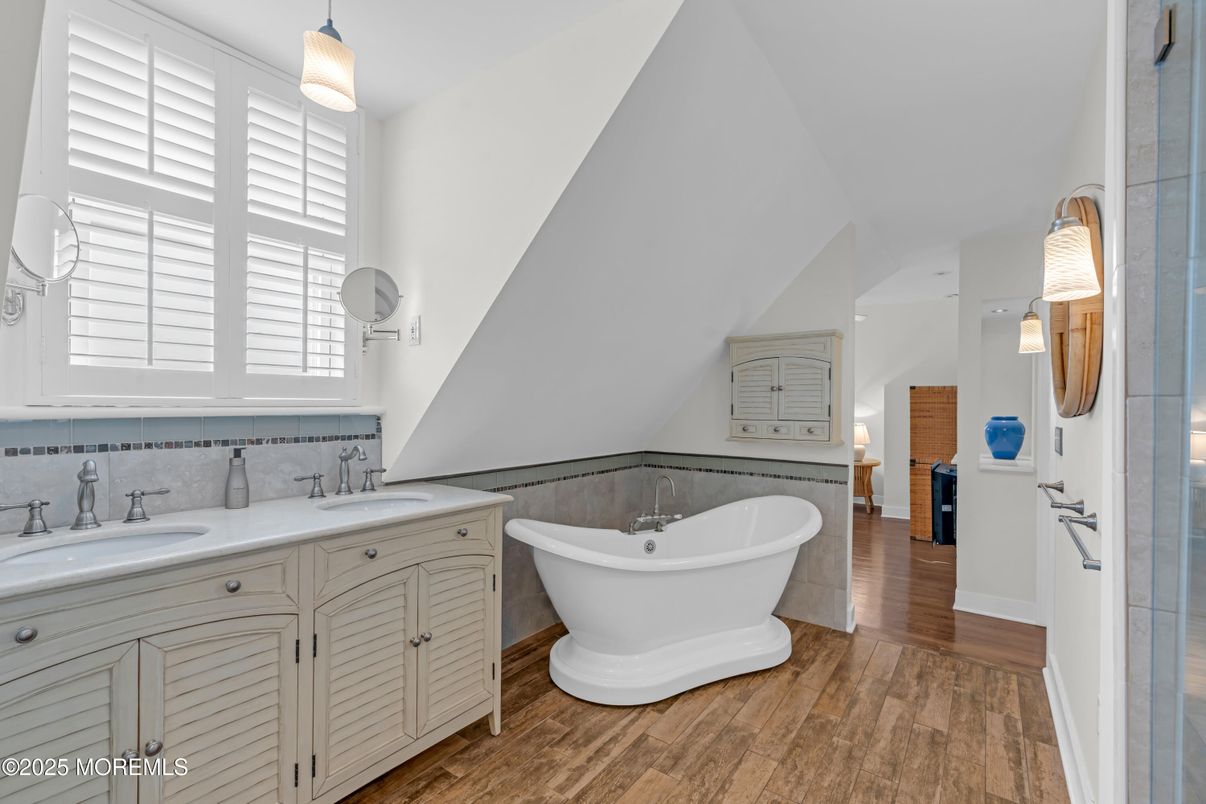 Bathroom, Dual Sink Vanities, Free Standing Baths, Interior, Pendant Lights, Wood Texture Flooring