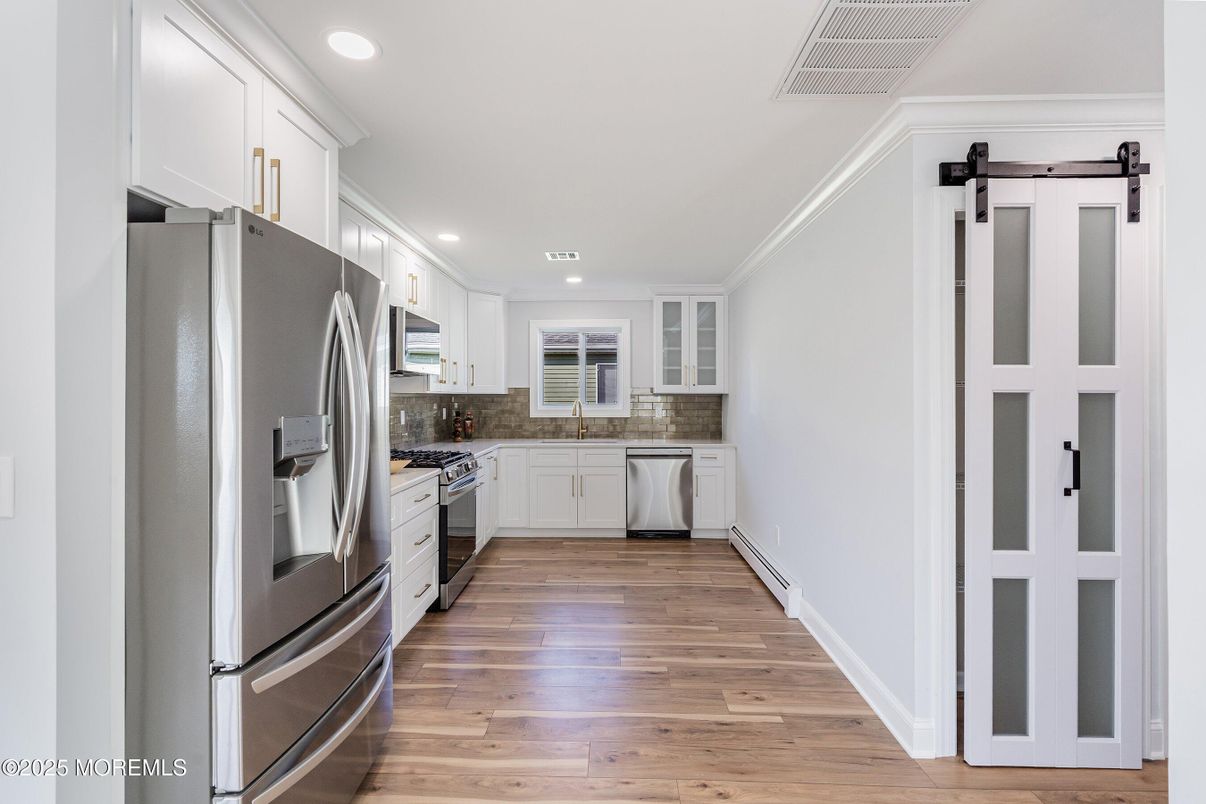 Interior, Kitchen, Recessed Lighting, Stainless Steel Appliances, Wood Texture Flooring