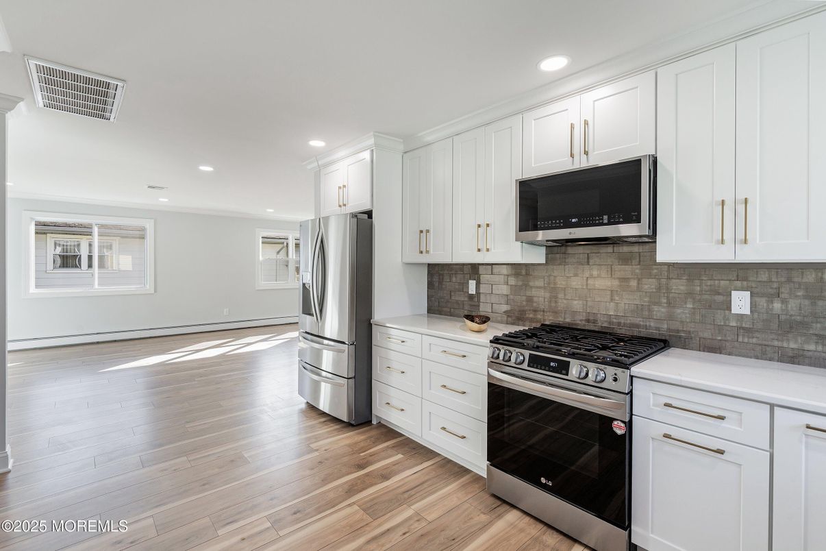 Interior, Kitchen, Recessed Lighting, Stainless Steel Appliances, Wood Texture Flooring