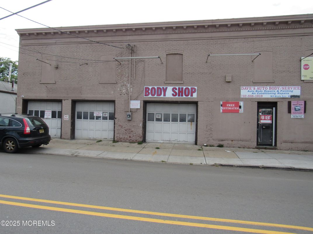 Attached, Exterior, Facade, Brick Facade, Condo Building