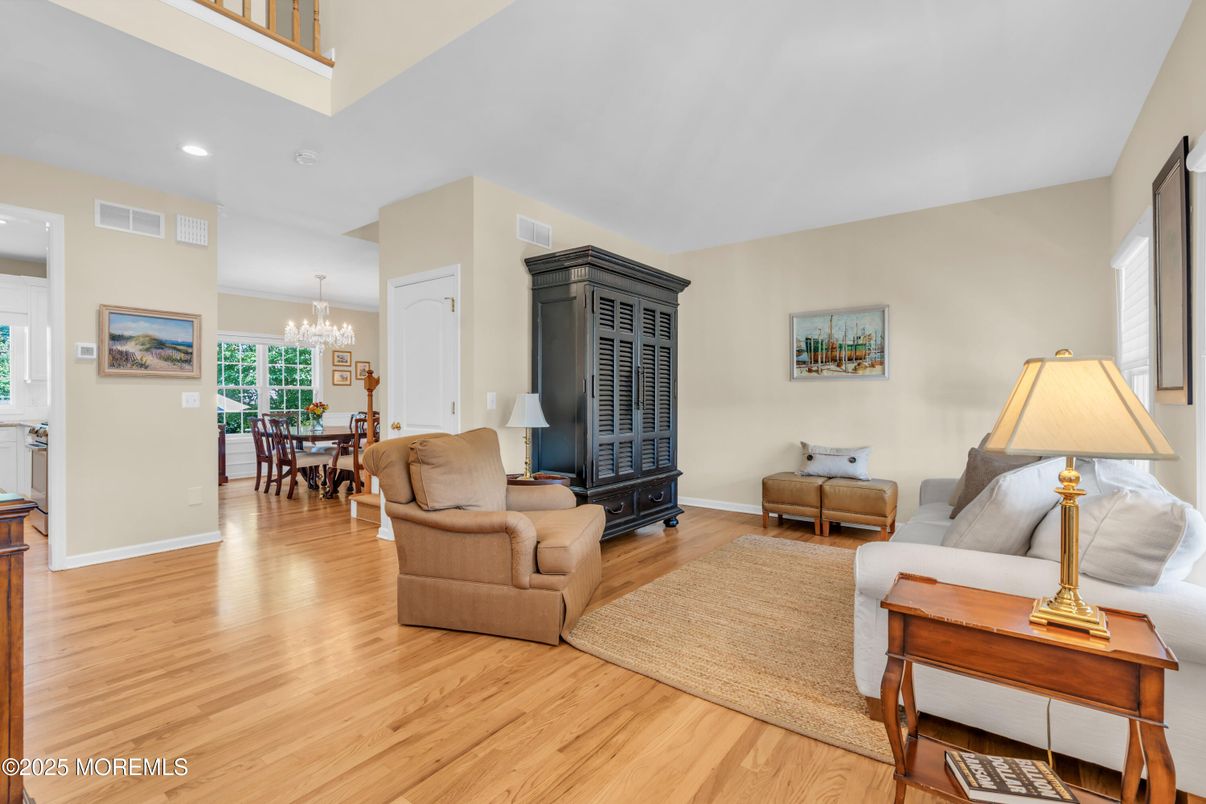 Chandelier, Dining room, Fireplace, Interior, Living room, Recessed Lighting, Wood Texture Flooring
