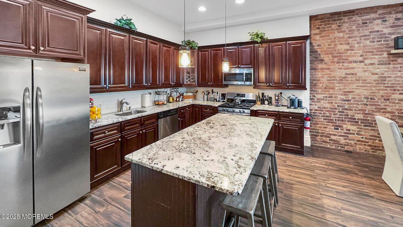 Interior, Kitchen, Pendant Lights, Recessed Lighting, Stainless Steel Appliances, Stone Walls, Wood Texture Flooring