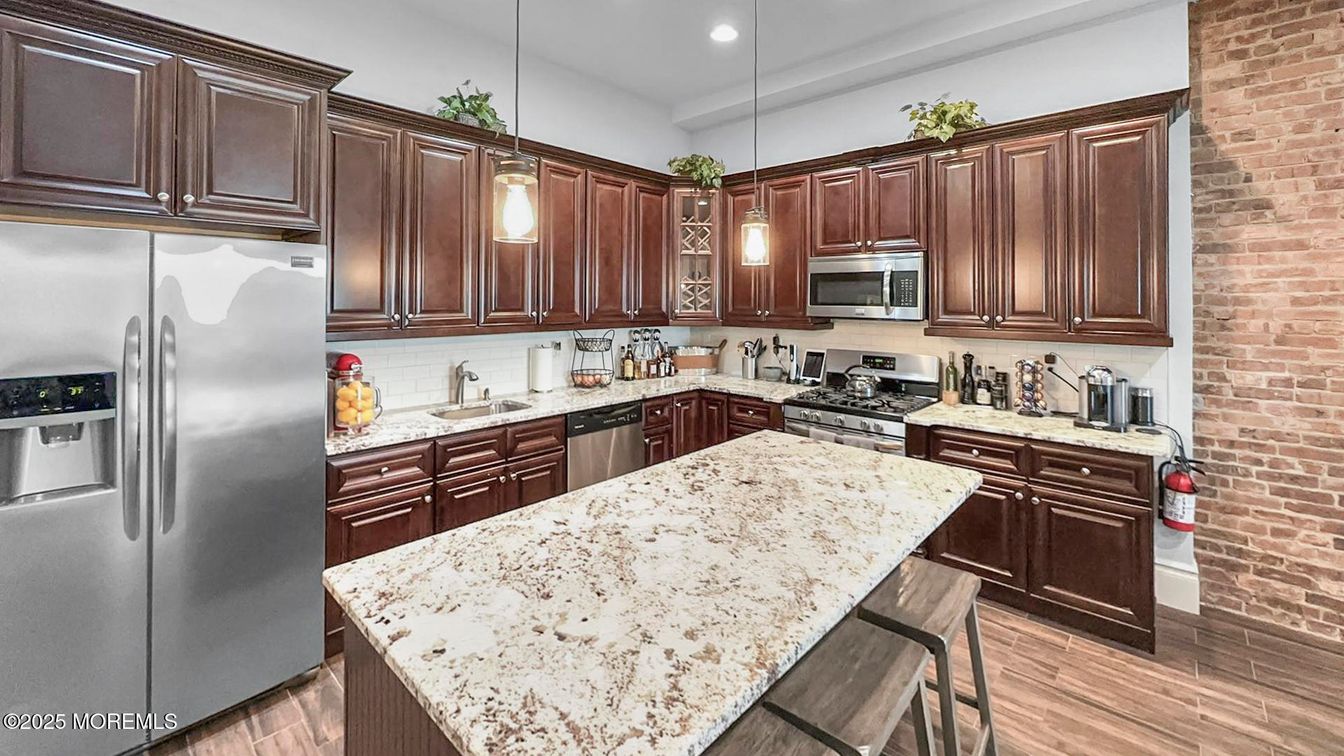 Interior, Kitchen, Pendant Lights, Recessed Lighting, Stainless Steel Appliances, Stone Walls, Wood Texture Flooring