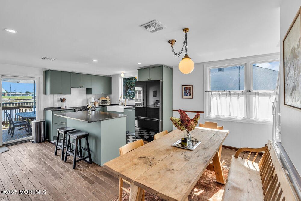Dining room, Interior, Kitchen, Pendant Lights, Recessed Lighting, Stainless Steel Appliances, Wood Texture Flooring