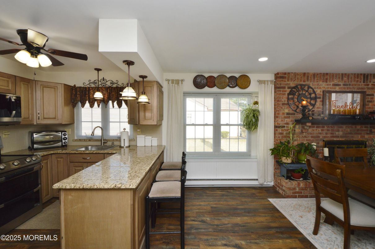Interior, Kitchen, Recessed Lighting, Stainless Steel Appliances, Stone Walls, Wood Texture Flooring