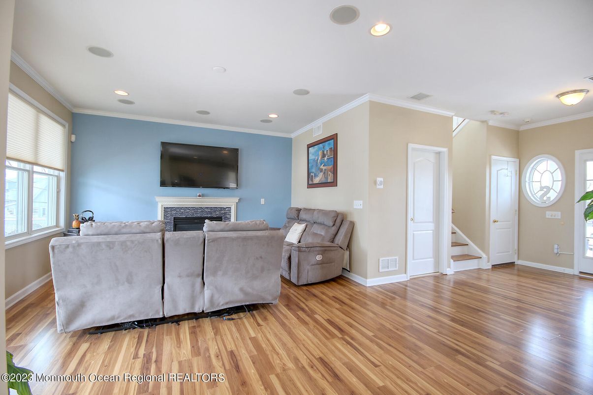 Fireplace, Interior, Living room, Recessed Lighting, Wood Texture Flooring