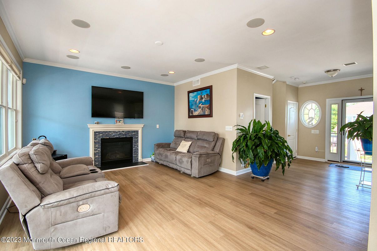 Fireplace, Interior, Living room, Recessed Lighting, Wood Texture Flooring