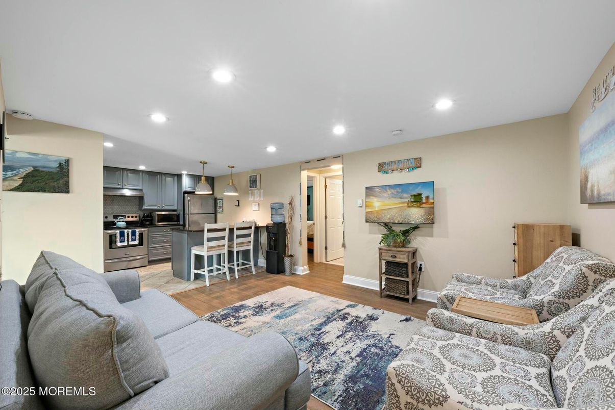 Dining room, Interior, Kitchen, Living room, Pendant Lights, Recessed Lighting, Stainless Steel Appliances, Wood Texture Flooring