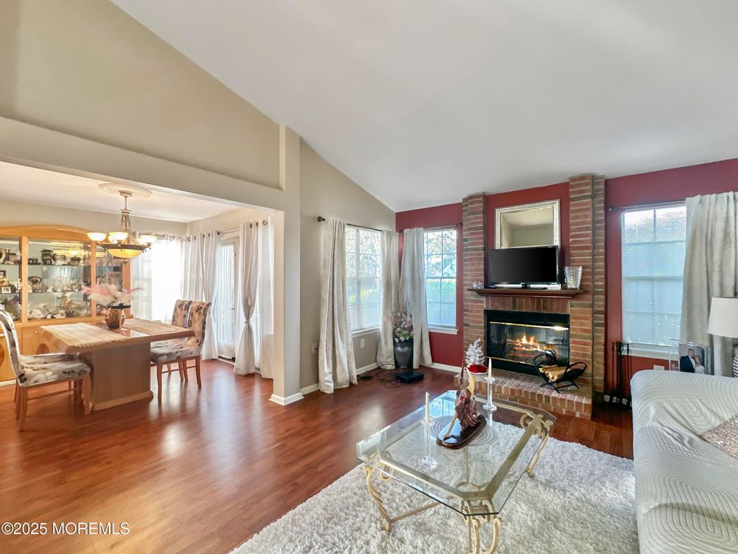 Chandelier, Dining room, Fireplace, Interior, Living room, Wood Texture Flooring