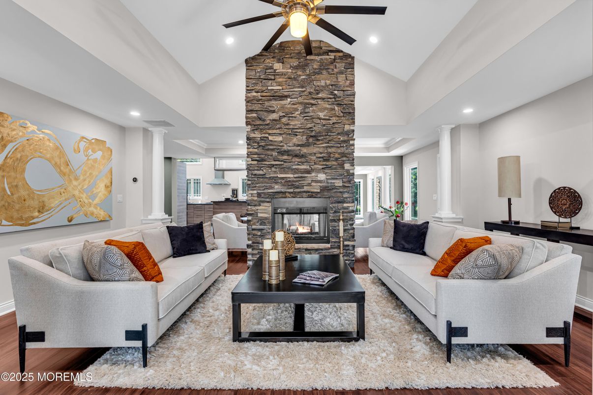 Fireplace, Interior, Living room, Recessed Lighting, Stone Walls, Wood Texture Flooring