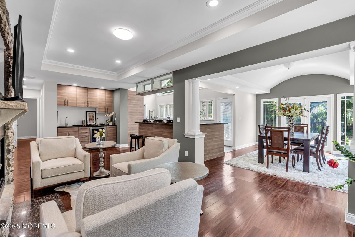 Dining room, Fireplace, Interior, Kitchen, Living room, Recessed Lighting, Wood Texture Flooring