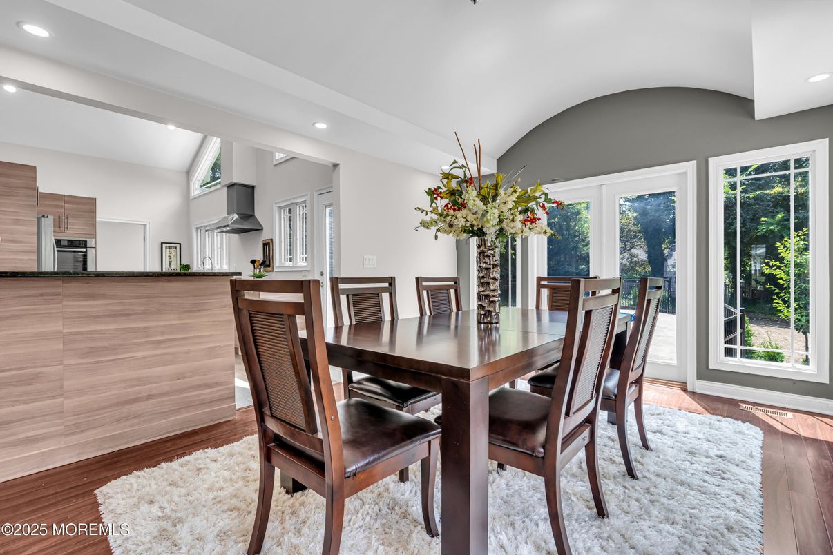 Dining room, Interior, Kitchen, Recessed Lighting, Stainless Steel Appliances, Wood Texture Flooring