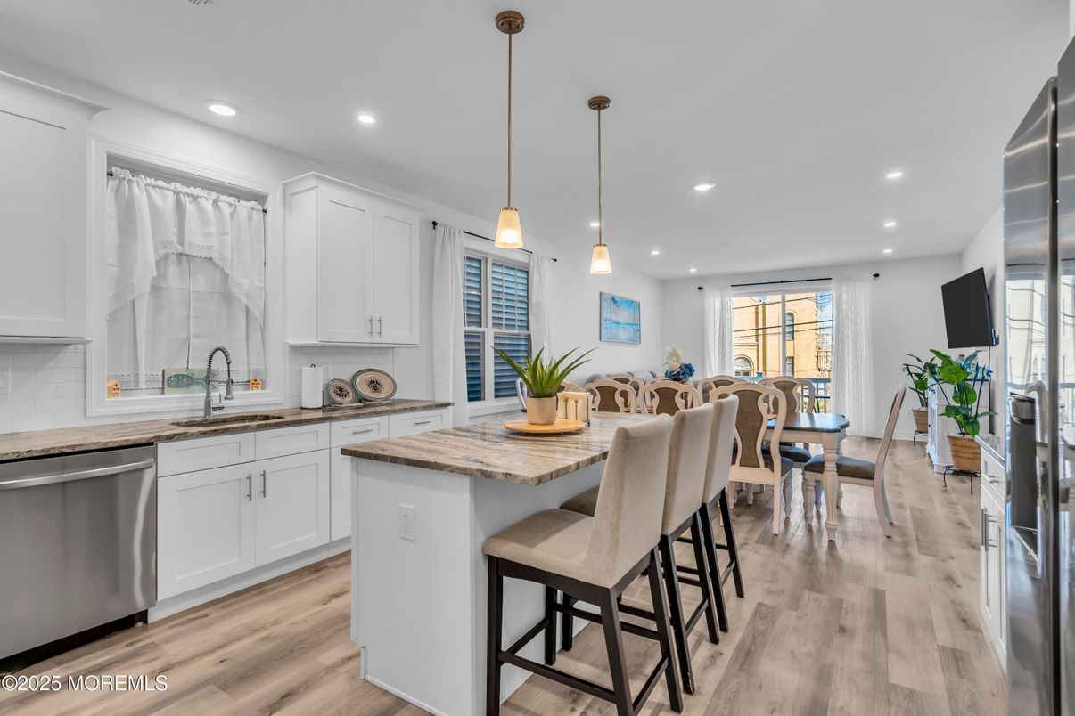Dining room, Interior, Kitchen, Pendant Lights, Recessed Lighting, Stainless Steel Appliances, Wood Texture Flooring