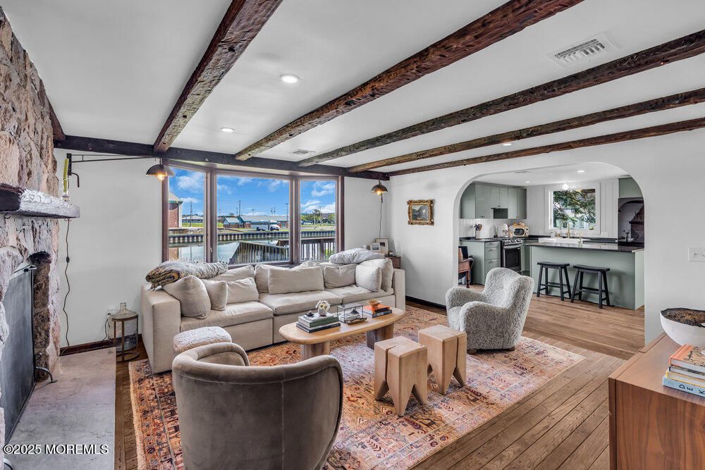 Fireplace, Interior, Kitchen, Living room, Recessed Lighting, Water, Wooden Beams, Wood Texture Flooring