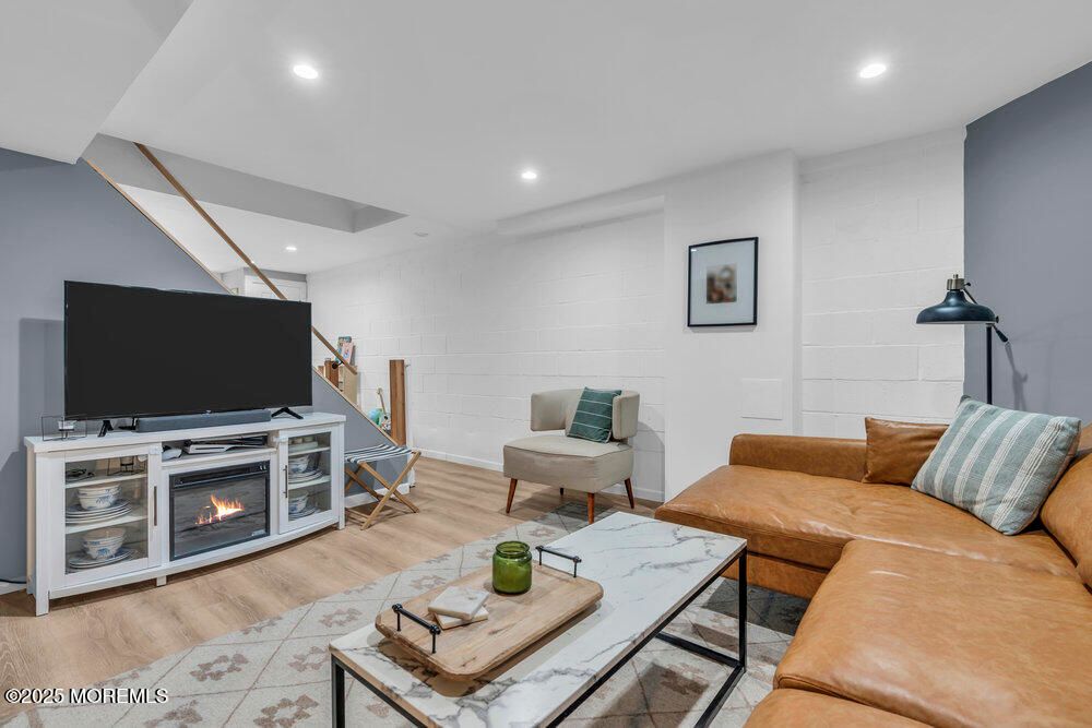 Fireplace, Interior, Living room, Recessed Lighting, Wood Texture Flooring