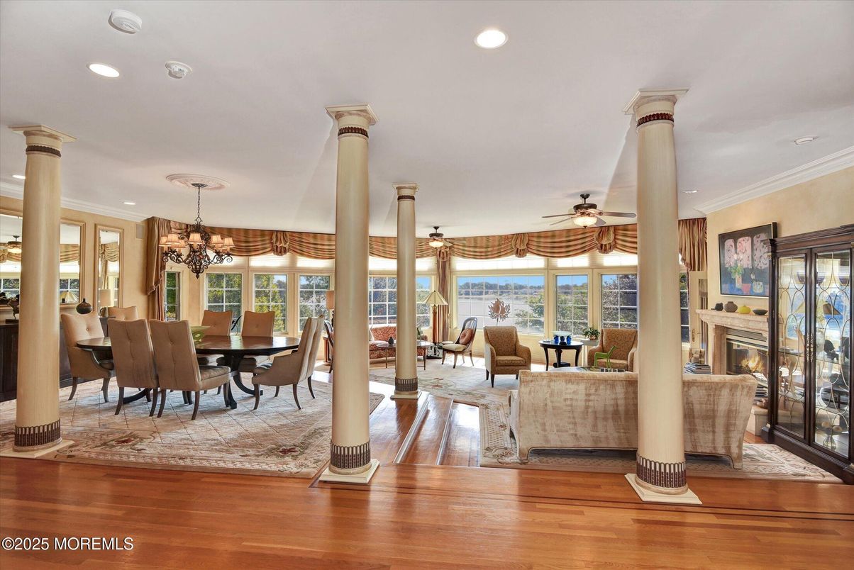 Chandelier, Dining room, Fireplace, Interior, Living room, Recessed Lighting, Wood Texture Flooring