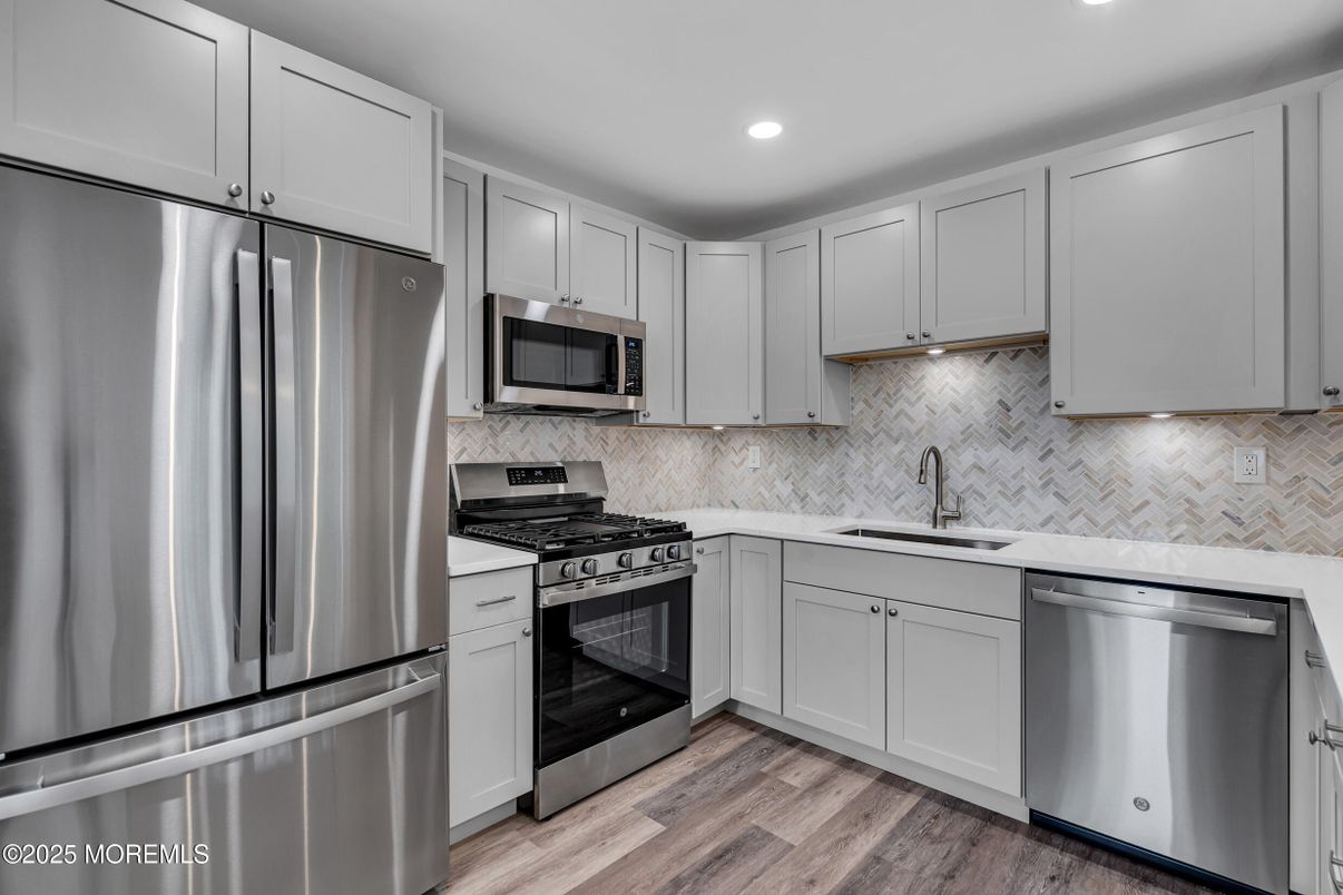 Interior, Kitchen, Recessed Lighting, Stainless Steel Appliances, Wood Texture Flooring