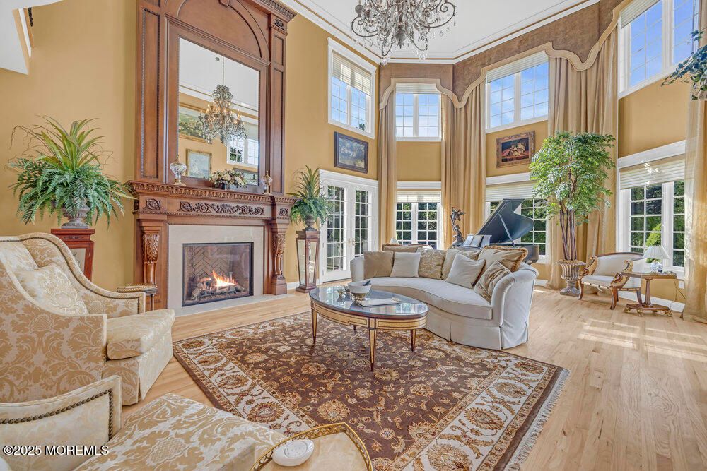 Chandelier, Fireplace, Interior, Living room, Piano, Wood Texture Flooring