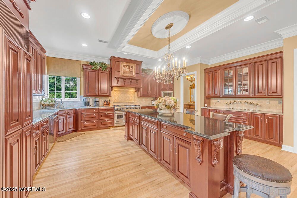 Chandelier, Interior, Kitchen, Recessed Lighting, Stainless Steel Appliances, Wood Texture Flooring