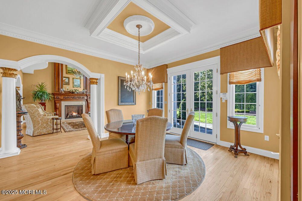 Chandelier, Dining room, Fireplace, Interior, Wood Texture Flooring