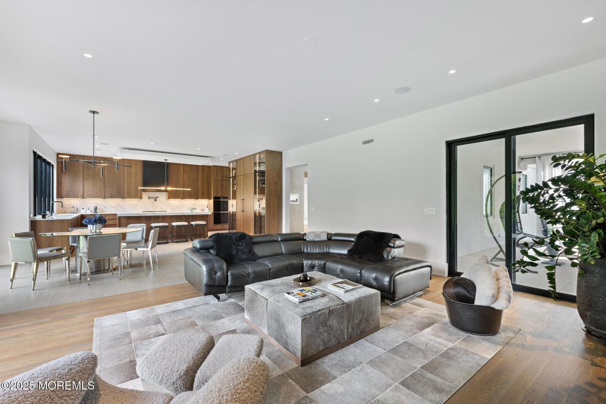 Dining room, Interior, Kitchen, Living room, Pendant Lights, Recessed Lighting, Stainless Steel Appliances, Wood Texture Flooring