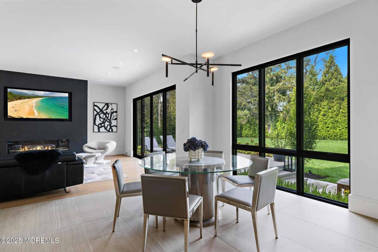 Dining room, Fireplace, Interior, Living room, Pendant Lights, Recessed Lighting, Wood Texture Flooring
