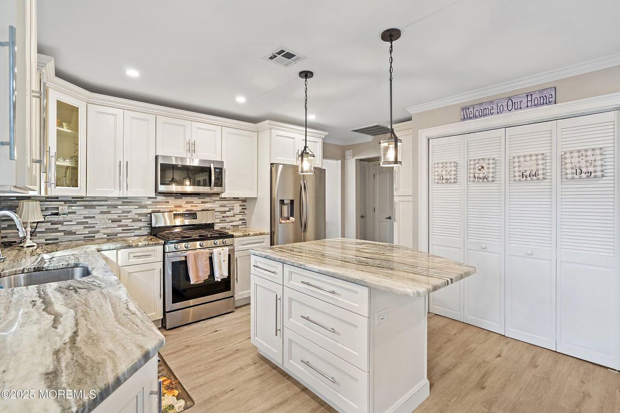 Interior, Kitchen, Pendant Lights, Recessed Lighting, Stainless Steel Appliances, Wood Texture Flooring