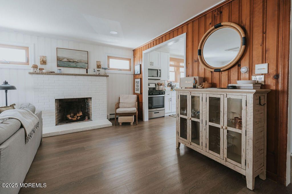 Fireplace, Interior, Kitchen, Recessed Lighting, Wood Texture Flooring, Wooden Walls