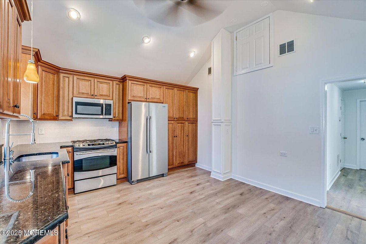 Interior, Kitchen, Pendant Lights, Recessed Lighting, Stainless Steel Appliances, Wood Texture Flooring