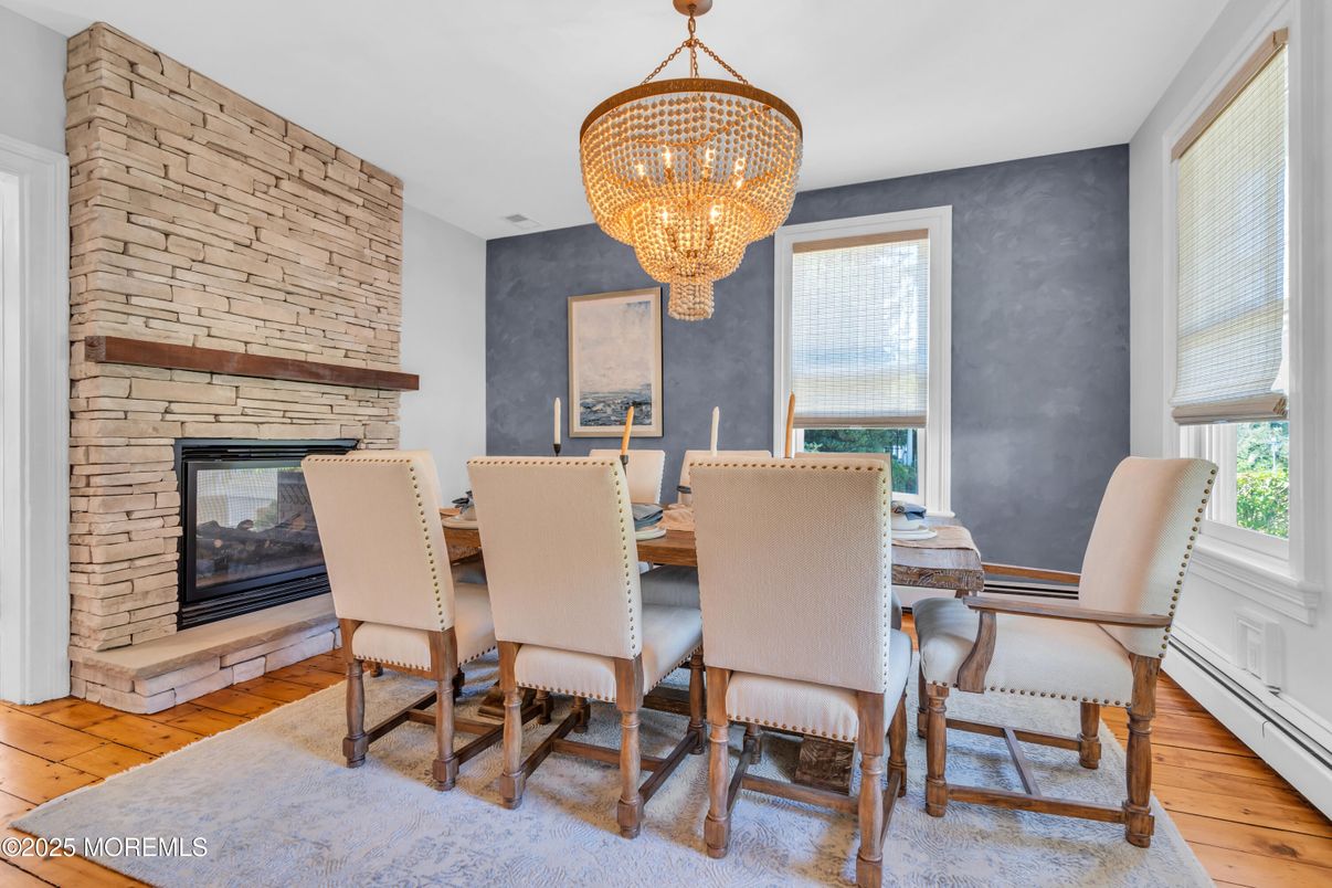 Chandelier, Dining room, Fireplace, Interior, Stone Walls, Wood Texture Flooring