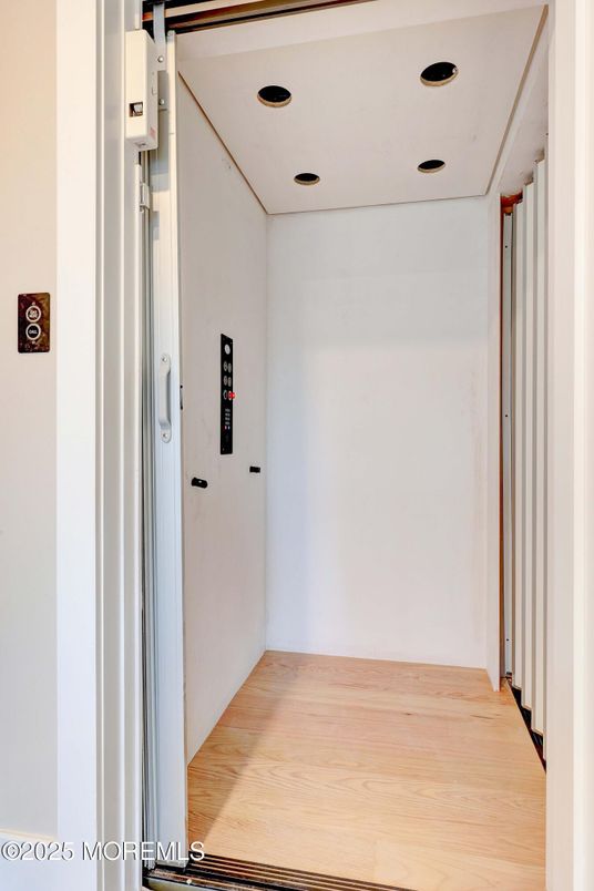 Elevator, Interior, Recessed Lighting, Wood Texture Flooring