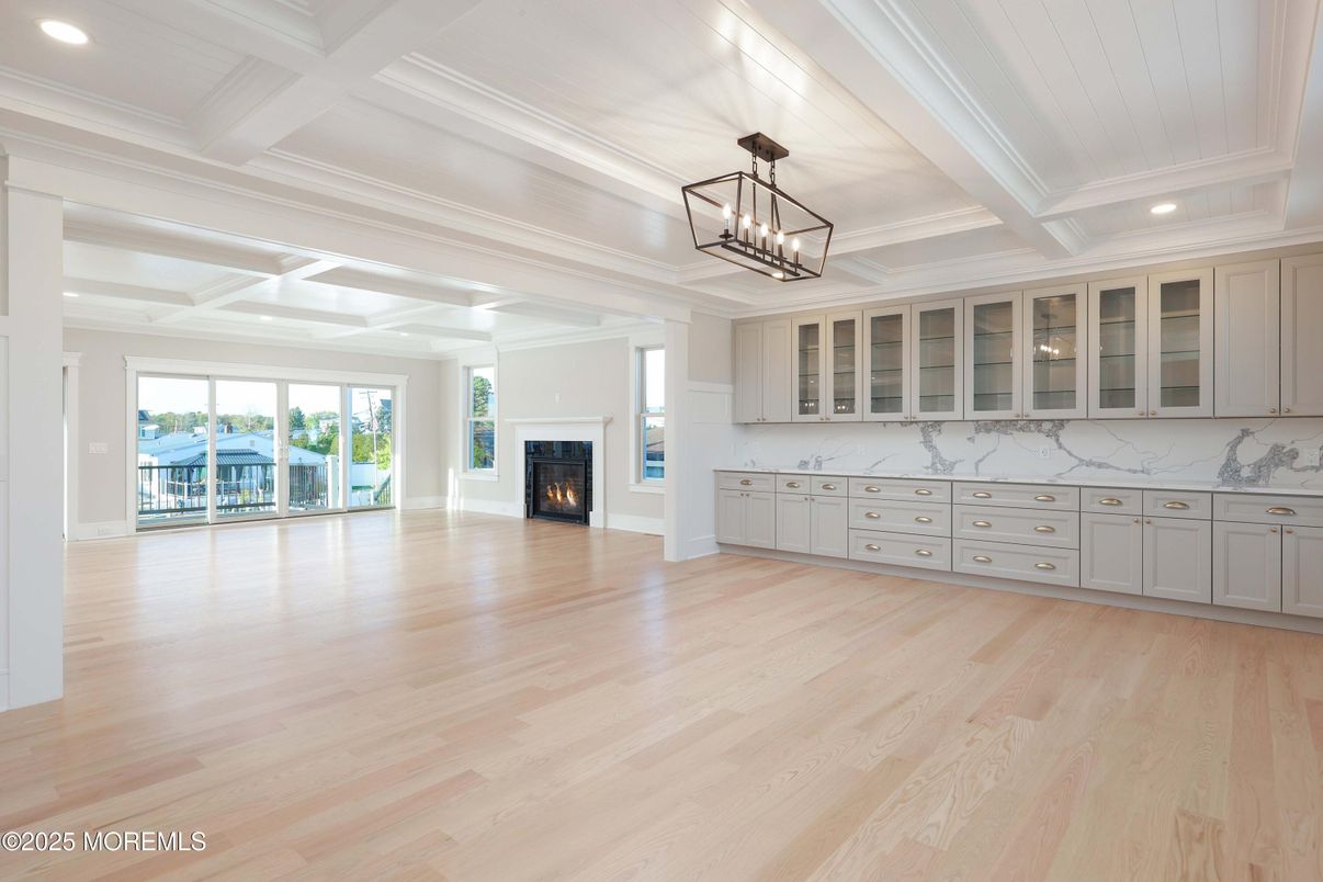 Empty room, Fireplace, Interior, Pendant Lights, Recessed Lighting, Wood Texture Flooring
