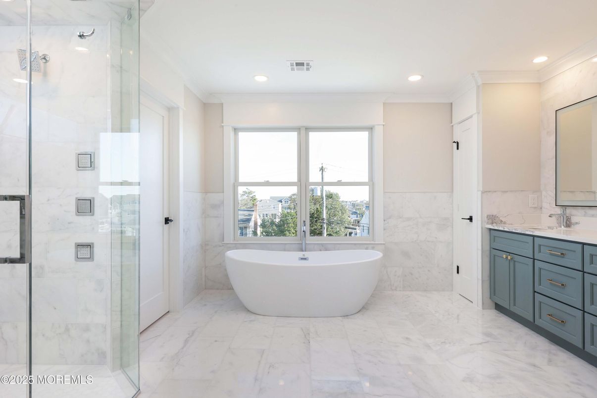 Bathroom, Free Standing Baths, Glass Shower, Interior, Marble, Marble Walls, Recessed Lighting