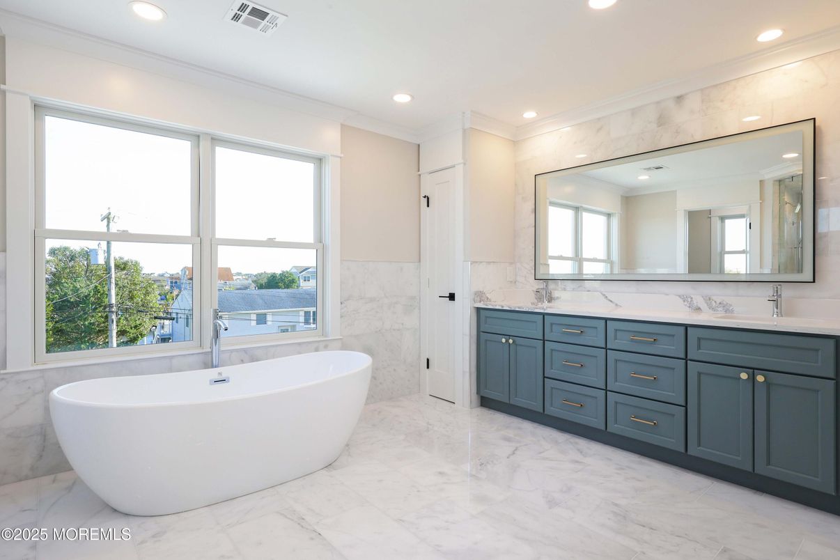 Bathroom, Dual Sink Vanities, Free Standing Baths, Interior, Marble, Marble Walls, Recessed Lighting