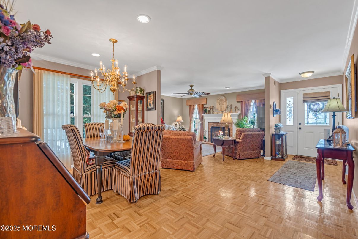 Chandelier, Dining room, Fireplace, Interior, Living room, Recessed Lighting, Wood Texture Flooring