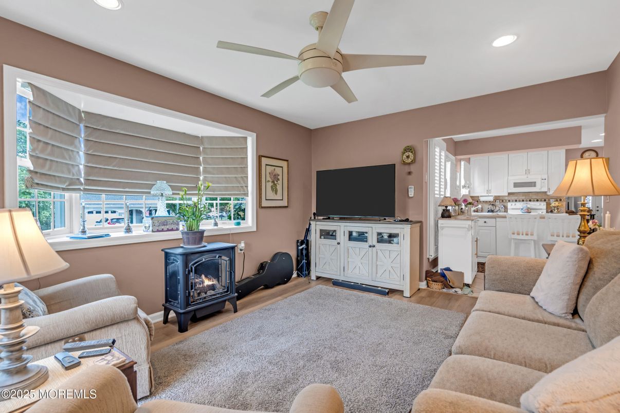 Fireplace, Interior, Kitchen, Living room, Recessed Lighting, Wood Texture Flooring