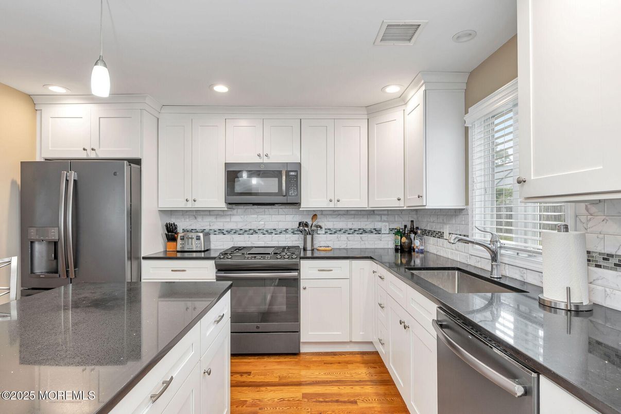 Interior, Kitchen, Pendant Lights, Recessed Lighting, Stainless Steel Appliances, Wood Texture Flooring