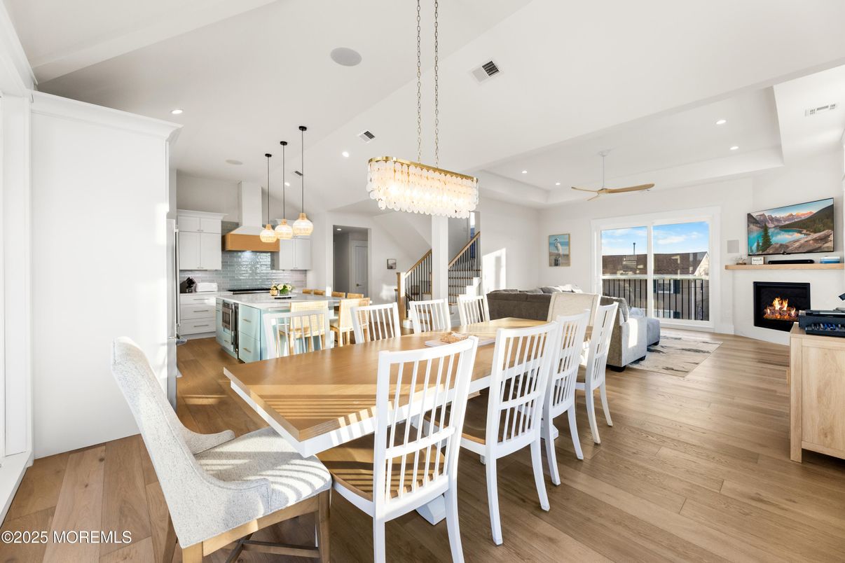 Chandelier, Dining room, Fireplace, Interior, Kitchen, Living room, Pendant Lights, Recessed Lighting, Wood Texture Flooring