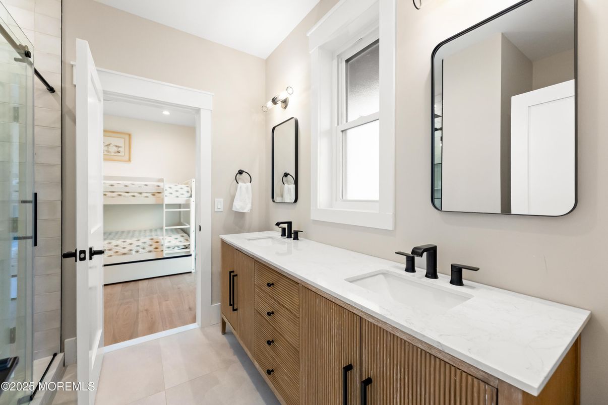Bathroom, Dual Sink Vanities, Glass Shower, Interior, Recessed Lighting, Wood Texture Flooring